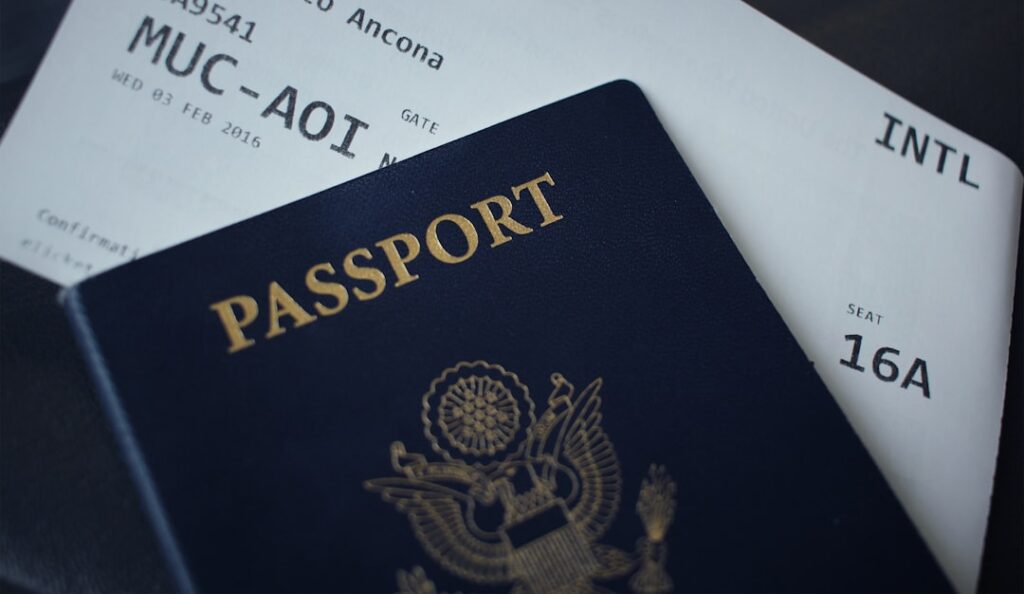 Passport and travel documents on desk